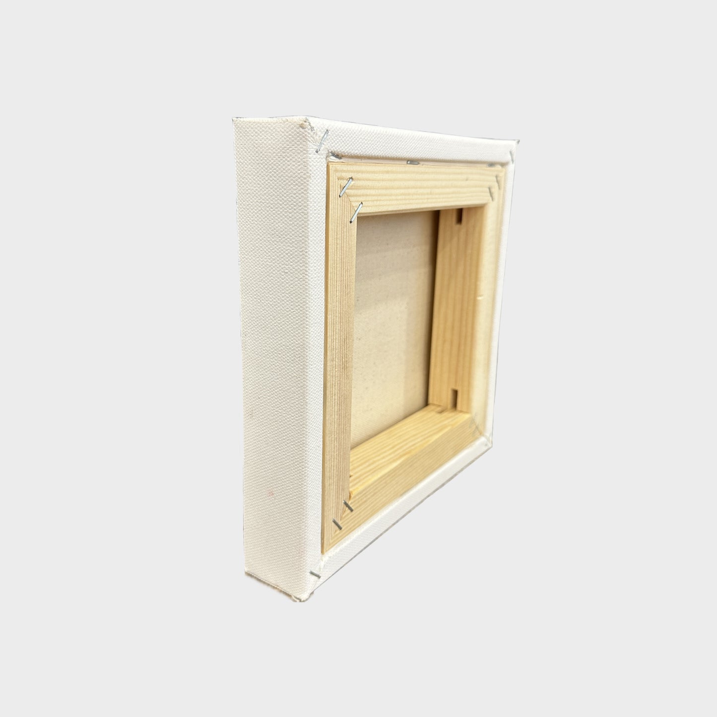 Edge angle view of the 8x8 inches (20.3x20.3 cm) canvas, revealing the meticulous craftsmanship behind the oil painting of a white cat in sunlight. This perspective showcases the quality of the canvas , ideal for home decor.