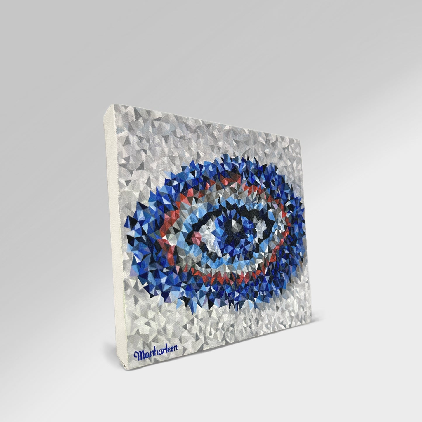 Side view of evil eye oil painting, painted in vibrant blues and a grey background, highlighting its depth, ideal for home decor and wall decor.