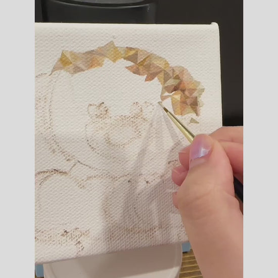 Behind-the-scenes video of the making process for an original oil painting, featuring the artist creating a light brown teddy bear with red roses in a triangular art style on a 4x4 canvas, highlighting the artistry and technique involved in crafting the ideal home decor.